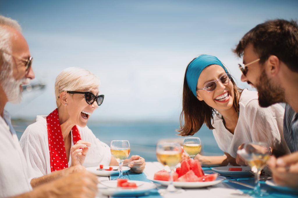 Friends laughing on a Yacht - Concierge Service